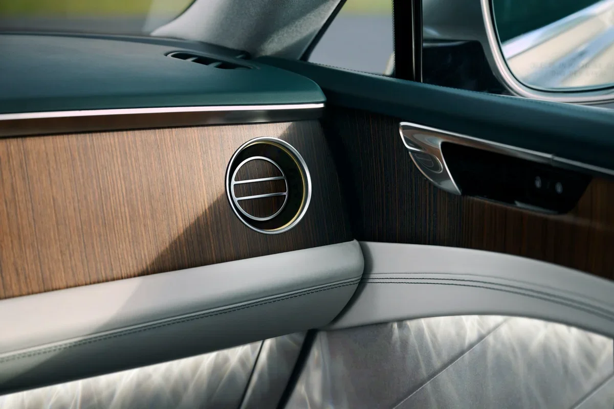 Walnut veneer, bullseye air vent and quilted leather inside the Bentley Torcal