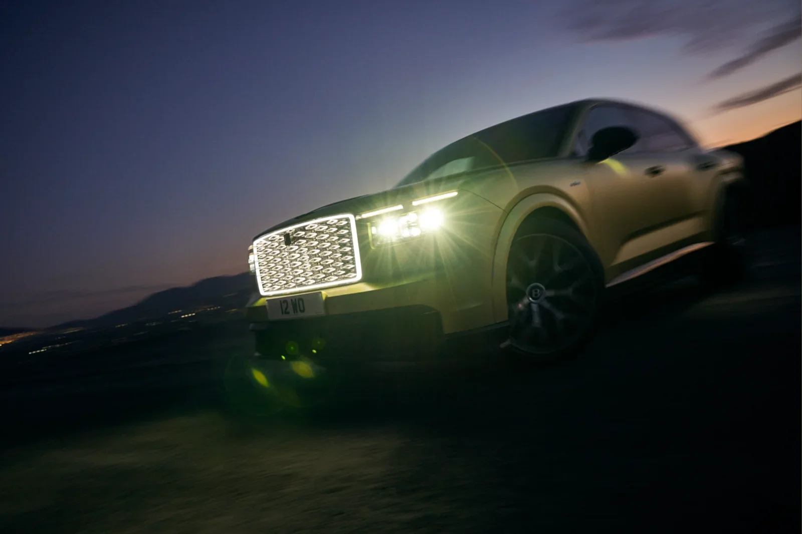 Bentley Torcal S at dusk with its illuminated diamond grille
